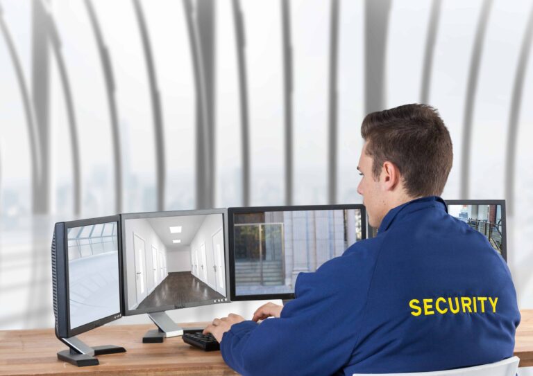 security-guard-looking-images-security-cameras-screens-office (1)